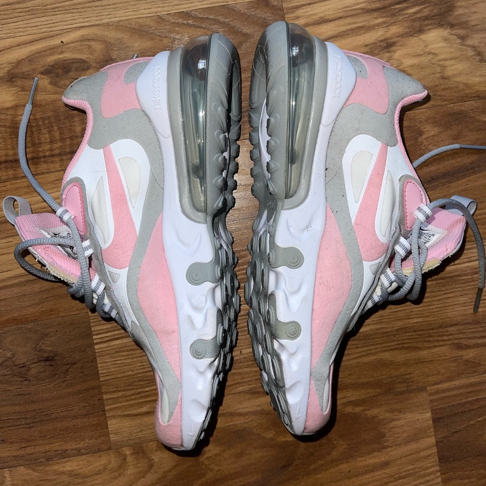 Size 4Y Pink, White, and Grey Nike Reacts
